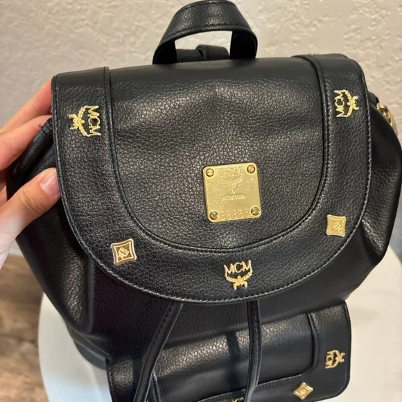 MCM Black Leather Backpack with Gold Accents - Picture 4 of 11